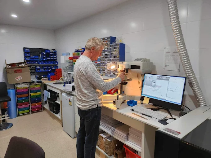 Andrew at work in the All Engraved laser engraving workshop